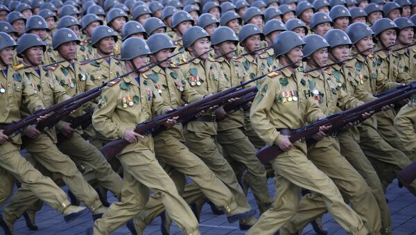 North Korean soldiers parade on Kim Il Sung Square, Saturday, Oct. 10, 2015, in Pyongyang, North Korea - Sputnik International