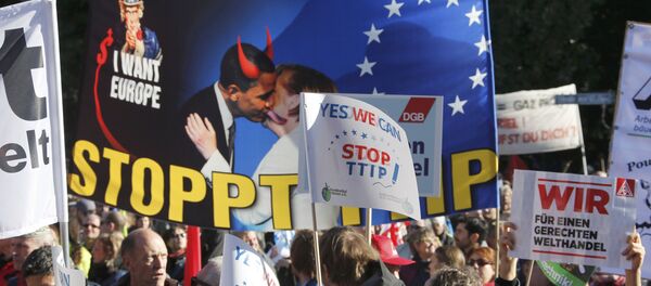 Consumer rights activists take part in a march to protest against the Transatlantic Trade and Investment Partnership (TTIP), mass husbandry and genetic engineering, in Berlin, Germany Consumer rights activists take part in a march to protest against the Transatlantic Trade and Investment Partnership (TTIP), mass husbandry and genetic engineering, in Berlin, Germany - Sputnik International