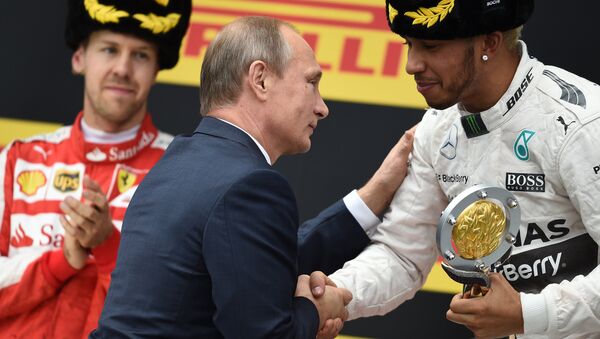 Vladimir Putin attends F1 Russian Grand Prix 2015 in Sochi - Sputnik International