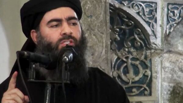 Leader of the Islamic State group, Abu Bakr al-Baghdadi, delivering a sermon at a mosque in Iraq - Sputnik International