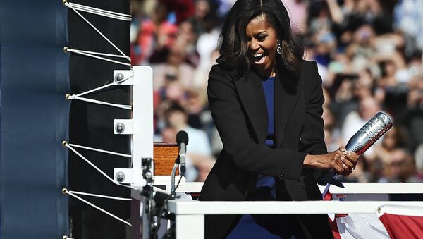 Michelle Obama at solemn ceremony of launching a new Navy submarine at a shipyard in Connecticut. - Sputnik International
