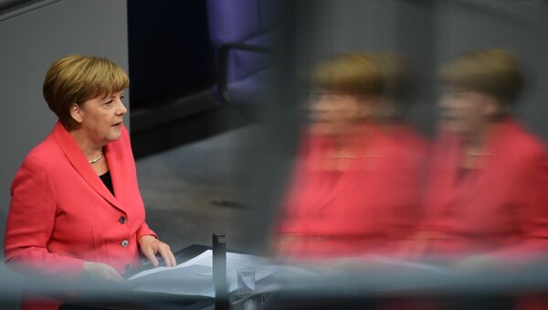 German Chancellor Angela Merkel addresses the Bundestag, the lower house of parliament in Berlin on September 24, 2015. Merkel said that a European Union deal to relocate 120,000 refugees was far from what was necessary to resolve the biggest migrant crisis facing the region since World War II. - Sputnik International