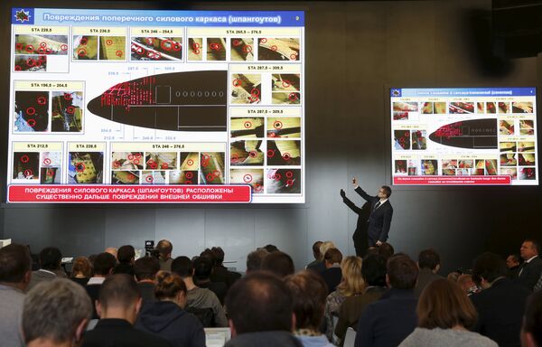 Journalists attend a news conference, organized by officials of Russian missile manufacturer Almaz-Antey and dedicated to the results of its investigation into Malaysia Airlines flight MH17 crash in eastern Ukraine, in Moscow, Russia, October 13, 2015 Journalists attend a news conference, organized by officials of Russian missile manufacturer Almaz-Antey and dedicated to the results of its investigation into Malaysia Airlines flight MH17 crash in eastern Ukraine, in Moscow, Russia, October 13, 2015 - Sputnik International