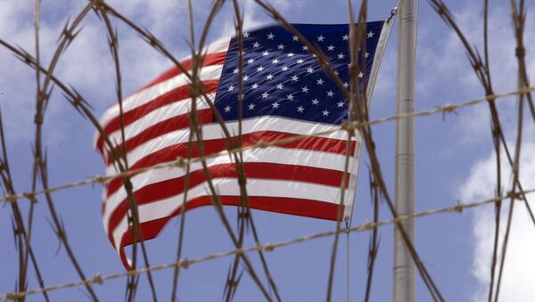 A US flag flies in this April 24 2007 file photo at Camp V inside Camp Delta at the US Naval Station in Guantanamo Bay, Cuba - Sputnik International