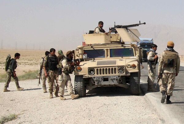 Afghan security forces prepare to check on reports of a possible ambush by the Taliban on the Baghlan-Kunduz highway, Afghanistan October 1, 2015 Afghan security forces prepare to check on reports of a possible ambush by the Taliban on the Baghlan-Kunduz highway, Afghanistan October 1, 2015 - Sputnik International