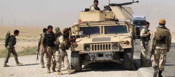 Afghan security forces prepare to check on reports of a possible ambush by the Taliban on the Baghlan-Kunduz highway, Afghanistan October 1, 2015 - Sputnik International