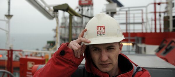 File photo of a worker stands near a pipe on the Russian LUKOIL ice-resistant fixed platform LSP-1 File photo of a worker stands near a pipe on the Russian LUKOIL ice-resistant fixed platform LSP-1 - Sputnik International