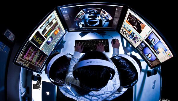 A man working on his computer - Sputnik International