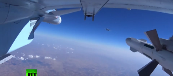 The Russian Defense Ministry released footage on Wednesday of bombs being dropped on targets in Syria. - Sputnik International