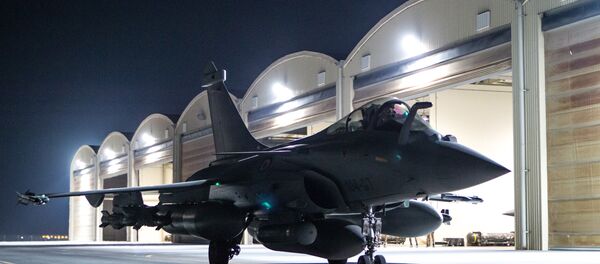This photo released on Friday, Oct. 9, 2015 by the French Army Communications Audiovisual office (ECPAD) shows a French army Rafale fighter jet on the tarmac of an undisclosed air base as part of France's Operation Chammal launched in September 2015 in support of the US-led coalition against Islamic State group - Sputnik International