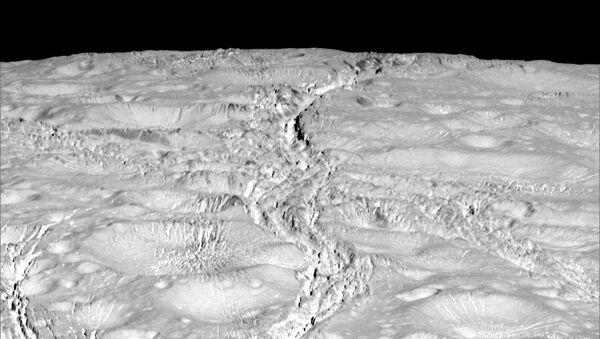 NASA's Cassini spacecraft zoomed by Saturn's icy moon Enceladus on Oct. 14, 2015, capturing this stunning image of the moon's north pole. - Sputnik International