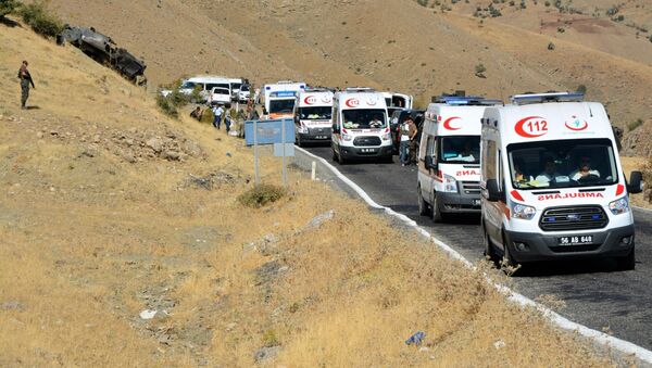 Turkish soldiers, security members and ambulances at the explosian site after soldiers were killed by a roadside bomb detonated by Kurdish rebels. - Sputnik International