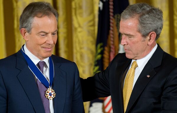 Then US President George W. Bush presents the Presidential Medal of Freedom to former British Prime Minister Tony Blair (L) in the East Room of the White House in Washington. Then US President George W. Bush presents the Presidential Medal of Freedom to former British Prime Minister Tony Blair (L) in the East Room of the White House in Washington. - Sputnik International