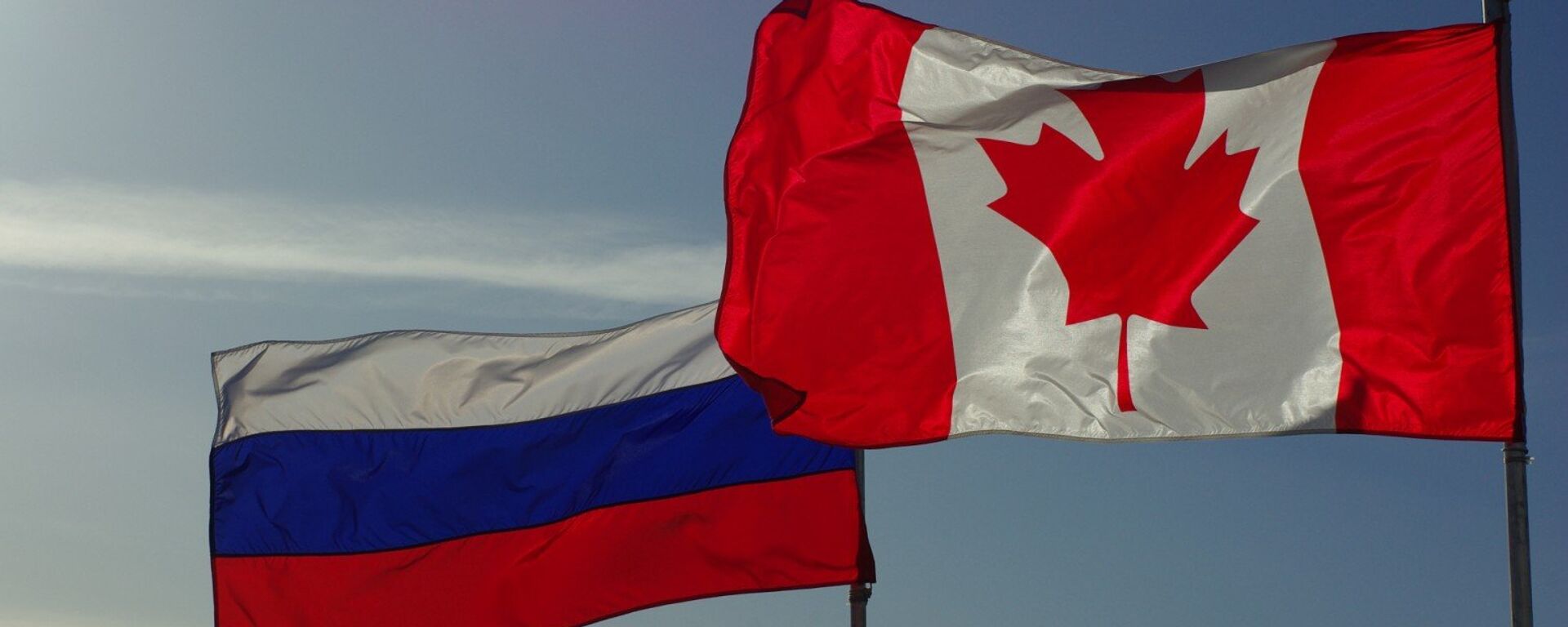 Russian and Canadian flags - Sputnik International, 1920, 03.02.2023