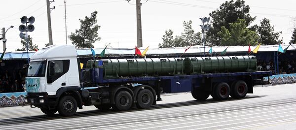 An Iranian military truck carries a Bavar-373 air defence missile system during the Army Day parade in Tehran on April 18, 2015 An Iranian military truck carries a Bavar-373 air defence missile system during the Army Day parade in Tehran on April 18, 2015 - Sputnik International