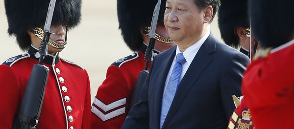 Chinese President Xi Jinping is escorted as he inspects a guard of honour during the official welcome ceremony at Horse Guards Parade in London, Tuesday, Oct. 20, 2015. - Sputnik International