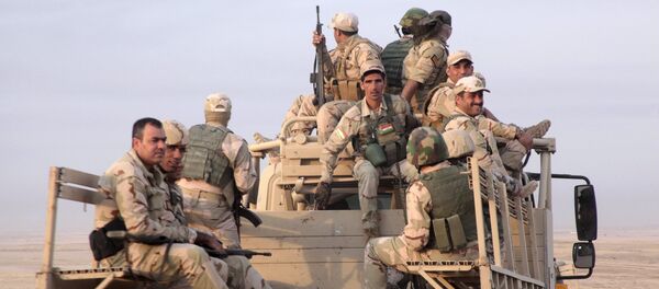 Members of the Kurdish security forces - Sputnik International