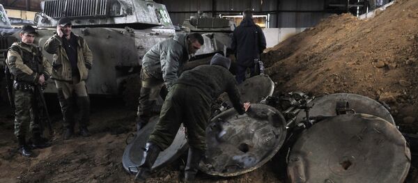 DPR self-defense fighters withdraw mortars from Donetsk. File photo DPR self-defense fighters withdraw mortars from Donetsk. File photo - Sputnik International