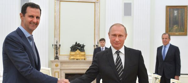 Russian President Vladimir Putin meets Syrian President Bashar Assad in the Kremlin on October 20. - Sputnik International