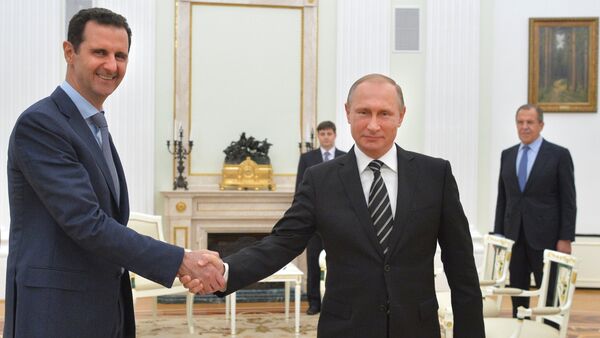 Russian President Vladimir Putin meets Syrian President Bashar Assad in the Kremlin on October 20. - Sputnik International