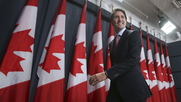 Canada's Liberal leader and Prime Minister-designate Justin Trudeau leaves at the conclusion of a news conference in Ottawa, Ontario, October 20, 2015 - Sputnik International