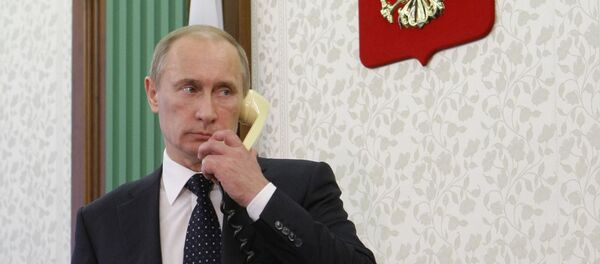 Russian Prime Minister Vladimir Putin meets Transport Minister Igor Levitin Russian Prime Minister Vladimir Putin meets Transport Minister Igor Levitin - Sputnik International