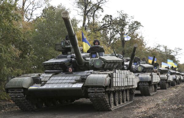 Ukrainian tanks move near Mariupol, Donetsk region, eastern Ukraine. file photo Ukrainian tanks move near Mariupol, Donetsk region, eastern Ukraine. file photo - Sputnik International