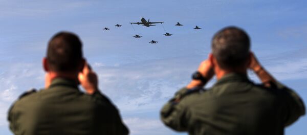 Soldiers take pictures of military aircrafts taking part in the opening ceremony of NATO’s large scale exercise Trident Juncture 2015 at the Italian Air Force Base in Trapani, Sicily - Sputnik International