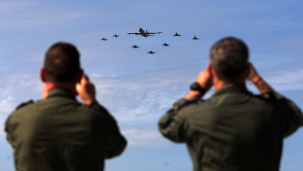 Soldiers take pictures of military aircrafts taking part in the opening ceremony of NATO’s large scale exercise Trident Juncture 2015 at the Italian Air Force Base in Trapani, Sicily - Sputnik International