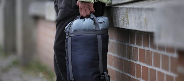 Omar, a 27-year-old cook originally from Deraa, stands in front of the asylum processing centre in Traiskirchen, Austria, October 13, 2015. Omar, a 27-year-old cook originally from Deraa, stands in front of the asylum processing centre in Traiskirchen, Austria, October 13, 2015. - Sputnik International