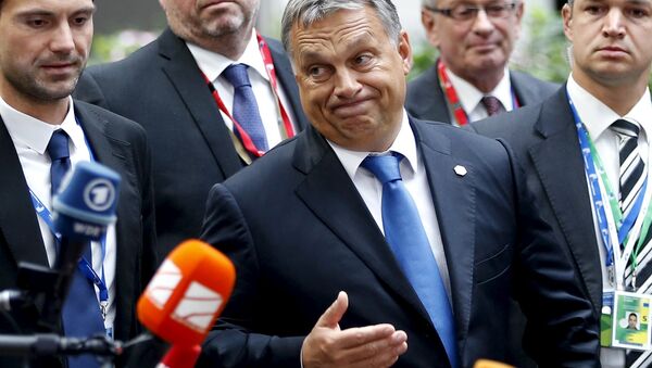 Hungary's Prime Minister Viktor Orban reacts as he arrives at a European Union leaders extraordinary summit on the migrant crisis, in Brussels, Belgium September 23, 2015. - Sputnik International