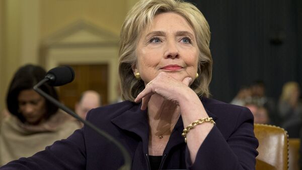 Democratic presidential candidate and former Secretary of State Hillary Rodham Clinton, listens as she testifies on Capitol Hill in Washington, Thursday, Oct. 22, 2015, before the House Select Committee on Benghazi - Sputnik International