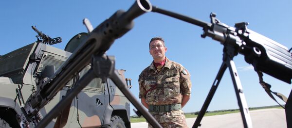 A soldier attends the opening ceremony of NATO’s large scale exercise Trident Juncture 2015 at the Italian Air Force Base in Trapani, Sicily. - Sputnik International