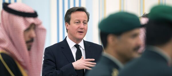British Prime Minister David Cameron attends a ceremony with dignitaries and leaders from around the world offering their condolences to new King Salman on January 24, 2015 at the Diwan royal palace in Riyadh, Saudi Arabia, a day after the death of King Abdullah. British Prime Minister David Cameron attends a ceremony with dignitaries and leaders from around the world offering their condolences to new King Salman on January 24, 2015 at the Diwan royal palace in Riyadh, Saudi Arabia, a day after the death of King Abdullah. - Sputnik International
