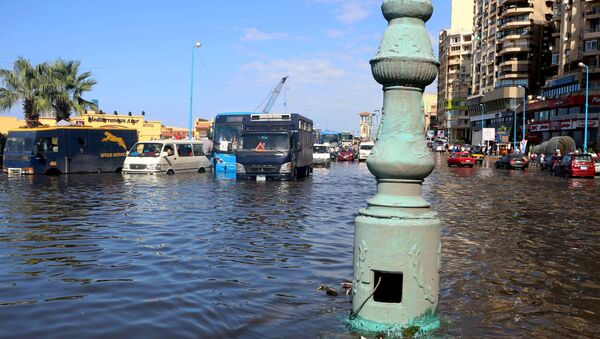 Cars and buses are seen in a main street after heavy rainfall in Alexandria, Egypt, October 25, 2015. - Sputnik International