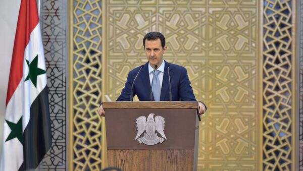 In this Sunday, July 26, 2015, file photo released by the Syrian official news agency SANA, Syrian President Bashar Assad delivers a speech in Damascus, Syria. - Sputnik International