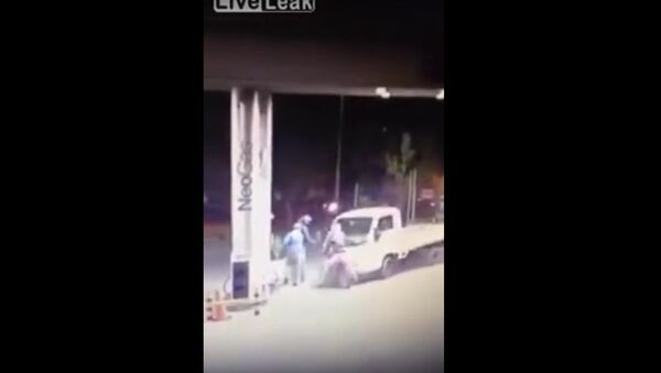 Truck Driver Turns Things Around Against Bandits at Service Station Read more at http://www.liveleak.com/view?i=865_1445921728#ExpmJOwpetuxfYYW.99 - Sputnik International