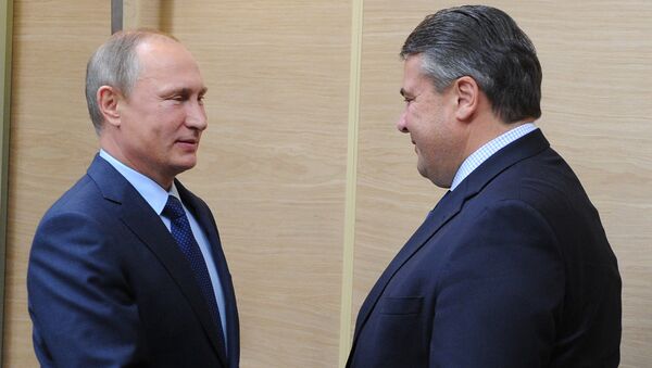 Russian President Vladimir Putin, left, and German Vice Chancellor and Minister for Economic Affairs and Energy Sigmar Gabriel during their meeting in Novo-Ogaryovo - Sputnik International