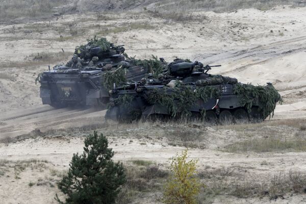 German army Marder infantry fighting vehicles participate in Operation Hazel” military drill at the Adazi training field, Latvia, October 22, 2015 German army Marder infantry fighting vehicles participate in Operation Hazel” military drill at the Adazi training field, Latvia, October 22, 2015 - Sputnik International