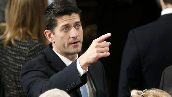 Rep. Paul Ryan (R-WI) gestures to colleagues on the floor prior to the start of the election for the new Speaker of the U.S. House of Representatives in the House Chamber in Washington October 29, 2015 - Sputnik International
