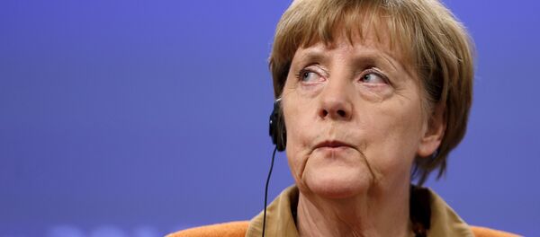 Germany's Chancellor Angela Merkel addresses a news conference after a meeting over the Balkan refugee crisis with leaders from central and eastern Europe at the EU Commission headquarters in Brussels, Belgium, October 26, 2015 Germany's Chancellor Angela Merkel addresses a news conference after a meeting over the Balkan refugee crisis with leaders from central and eastern Europe at the EU Commission headquarters in Brussels, Belgium, October 26, 2015 - Sputnik International