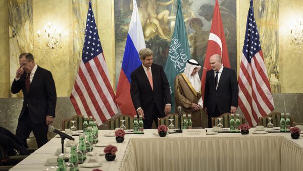 (From left) Russian Foreign Minister Sergei Lavrov, US Secretary of State John Kerry, Saudi Foreign Minister Adel al-Jubeir and Turkish Foreign Minister Feridun Sinirlioglu take their seats before a meeting at the Hotel Imperial at Hotel Imperial on October 29, 2015 in Vienna, Austria - Sputnik International