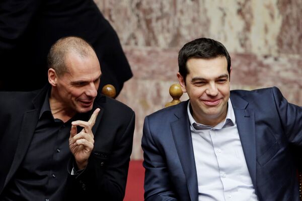 Greece's Prime Minister Alexis Tsipras, right, and Finance Minister Yanis Varoufakis chat during a Presidential vote in Athens, on Wednesday, Feb. 18, 2015. Greece's Prime Minister Alexis Tsipras, right, and Finance Minister Yanis Varoufakis chat during a Presidential vote in Athens, on Wednesday, Feb. 18, 2015. - Sputnik International