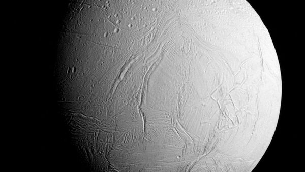 NASA's Cassini spacecraft captured this view as it neared icy Enceladus for its closest-ever dive past the moon's active south polar region - Sputnik International
