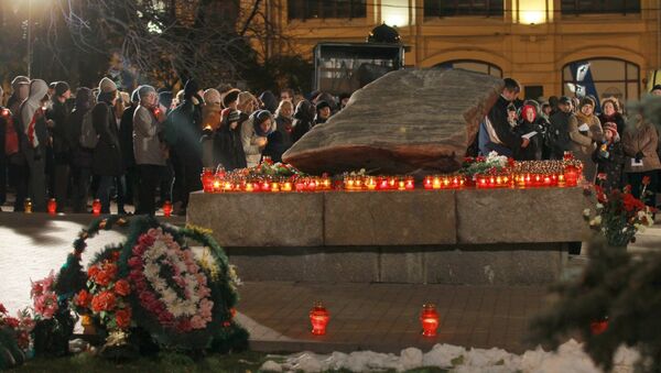 Return of Names action at Solovetsky stone in Moscow on the eve of the Day of Remembrance of the Victims of Political Repression. File photo - Sputnik International