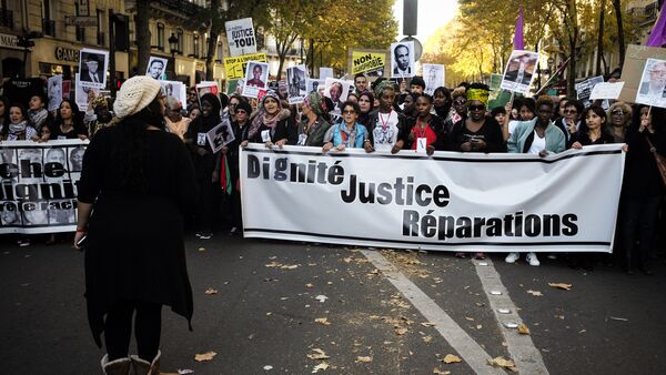 People gather during a March for Dignity and against Racism, called by the women's collective MAFED on October 31, 2015 in Paris - Sputnik International