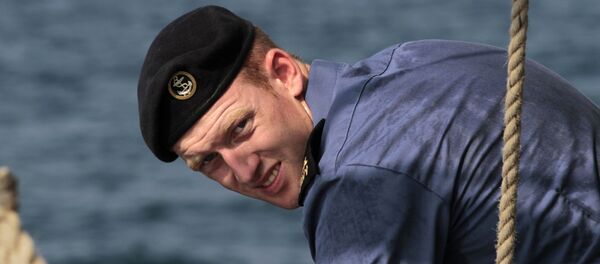 In this picture taken Friday, Sept. 21, 2012, an unidentified British sailor works aboard the British Royal Navy's HMS Atherstone in the Persian Gulf. More than 30 nations are participating in an exercise responding to simulated sea-mine attacks in international waters _ a demonstration of international resolve to ensure maritime security in the strategic but volatile region. - Sputnik International