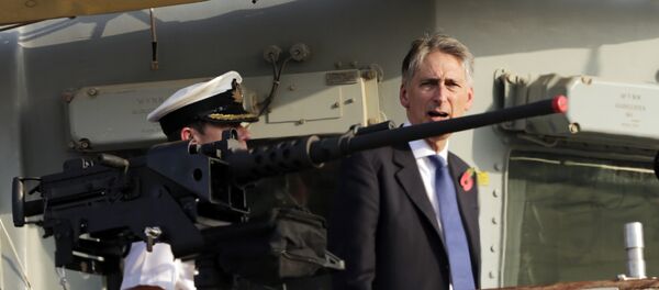 Former British Foreign Secretary Philip Hammond boards a British military ship docked in Manama, Bahrain after helping lay a cornerstone for a new British military base being built in Bahrain, Saturday, Oct. 31, 2015. Britain hasn't had a permanent military base in Bahrain since its former colony declared independence from Britain in 1971, though close ties have continued. Former British Foreign Secretary Philip Hammond boards a British military ship docked in Manama, Bahrain after helping lay a cornerstone for a new British military base being built in Bahrain, Saturday, Oct. 31, 2015. Britain hasn't had a permanent military base in Bahrain since its former colony declared independence from Britain in 1971, though close ties have continued. - Sputnik International