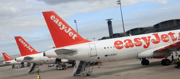 Airbus A 320 airplanes from low cost airline EasyJet are parked at Paris Roissy Charles de Gaulle airport in Roissy en France, north of Paris on April 29, 2013 Airbus A 320 airplanes from low cost airline EasyJet are parked at Paris Roissy Charles de Gaulle airport in Roissy en France, north of Paris on April 29, 2013 - Sputnik International