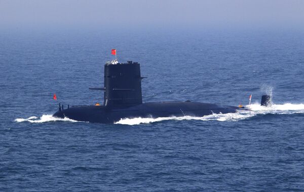 In this April 26, 2012 file photo released by China's Xinhua News Agency, Chinese navy's submarine attends the fleet review of the China-Russia joint naval exercise in the Yellow Sea In this April 26, 2012 file photo released by China's Xinhua News Agency, Chinese navy's submarine attends the fleet review of the China-Russia joint naval exercise in the Yellow Sea - Sputnik International